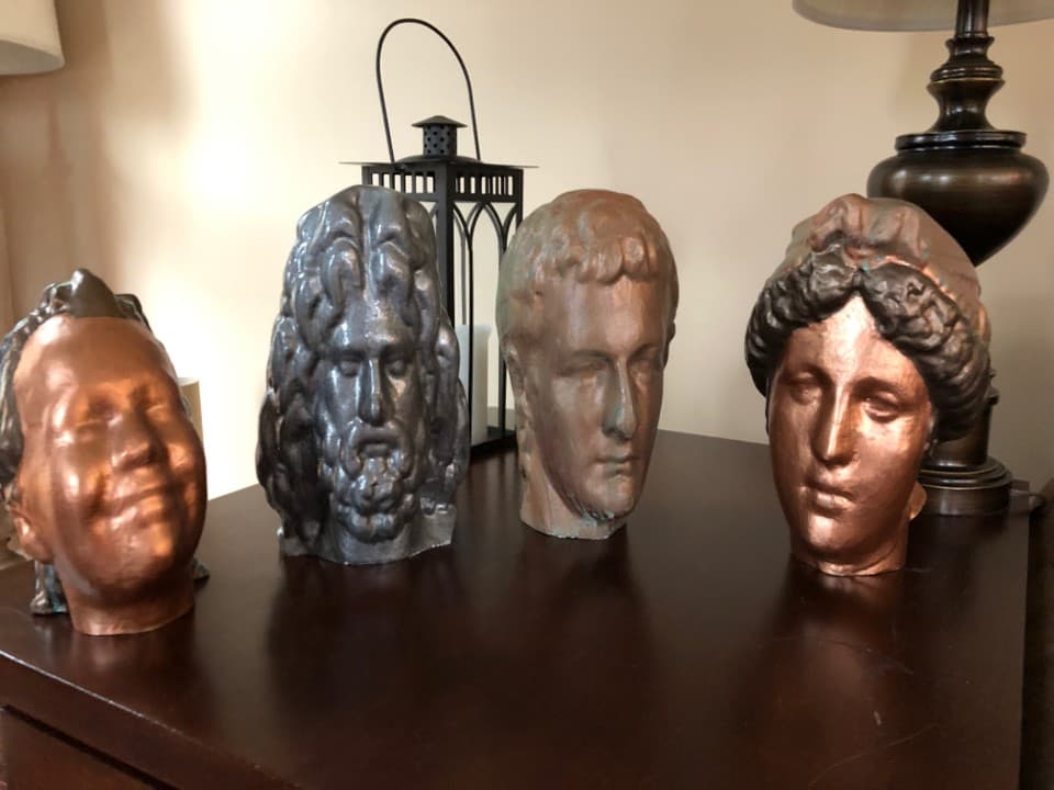 Finished CNC sculptures with bronze-style patina.